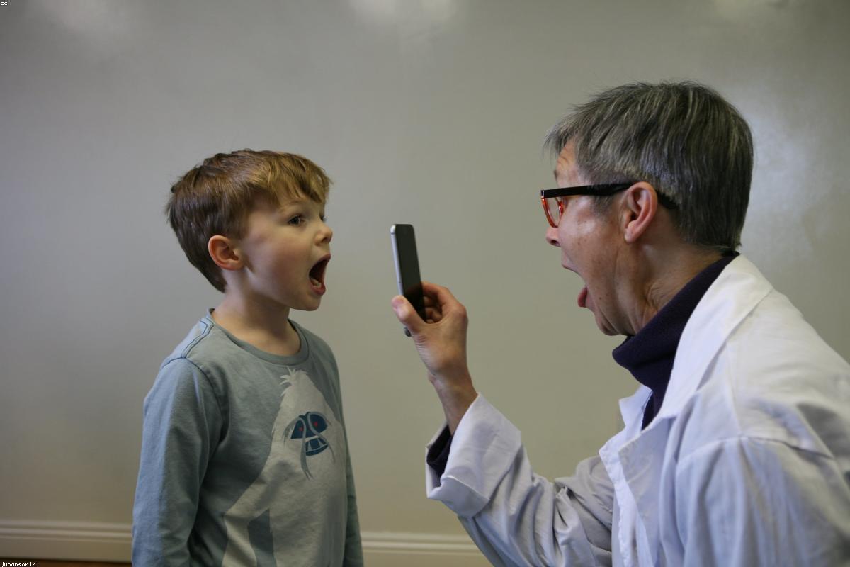 Doctor examining a patient representing proactive care